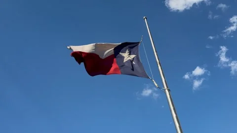 Texas flag flying at half staff in Austin, Tx 8/31/2026 Stock Footage 344213223