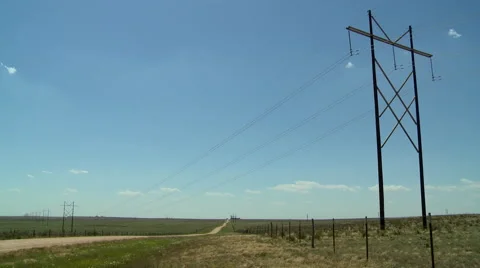 Texas Panhandle back road and power lines Stock Footage 40432514