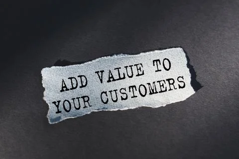 The text ADD VALUE TO YOUR CUSTOMERS on white background appearing behind tor 写真素材