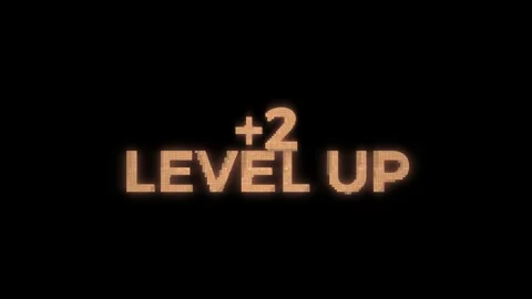 Text animation level up 2 display with glowing effect on black background with Stock Footage 345567843