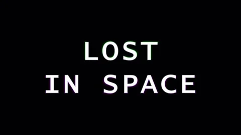 Text appears as 'LOST IN SPACE' with subtle cinematic light streaks on blac.. Video stock 344032342