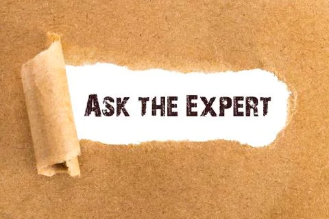 The text Ask the Expert appearing behind torn brown paper Stock Photos