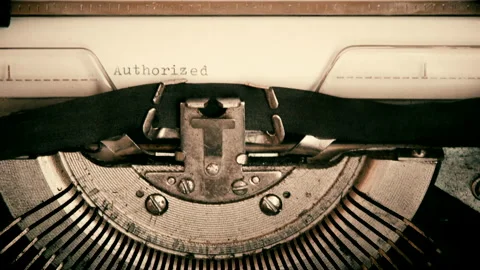 Text AUTHORIZED FOR RELEASE TO being typed on manual typewriter. Vintage Film Stock Footage 168322154