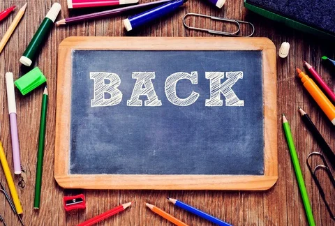 The text back to school written in a chalkboard Stock Footage 111275750