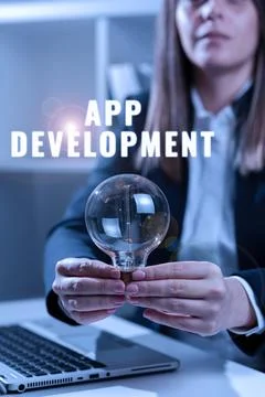 Text caption presenting App Development. Word for producing computer software Stock Photos