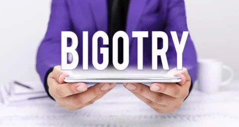 Text caption presenting Bigotry. Internet Concept obstinate or intolerant Stock Photos
