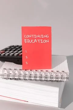 Text caption presenting Continuing Education. Word for Continued Learning Stock Photos