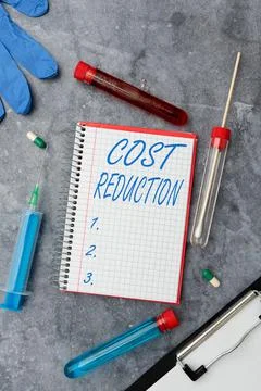 Text caption presenting Cost Reduction. Business showcase process of finding and 库存照片