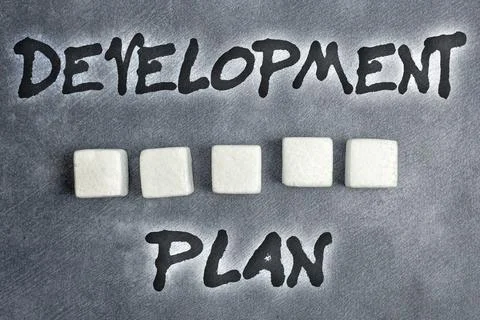 Text caption presenting Development Plan. Internet Concept the planning of the Stock Photos