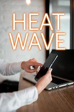 Text caption presenting Heat Wave. Concept meaning a prolonged period of Stock Photos