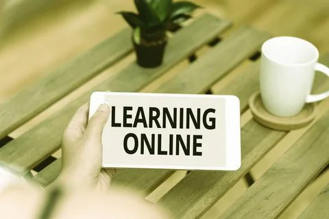 Text caption presenting Learning Online. Conceptual photo Learn something new Fotos de archivo
