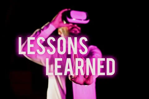 Text caption presenting Lessons LearnedPromote share and use knowledge derived 写真素材