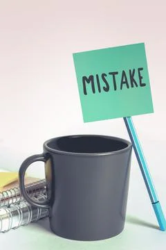 Text caption presenting Mistake, Business approach misconception about the me Stock Photos