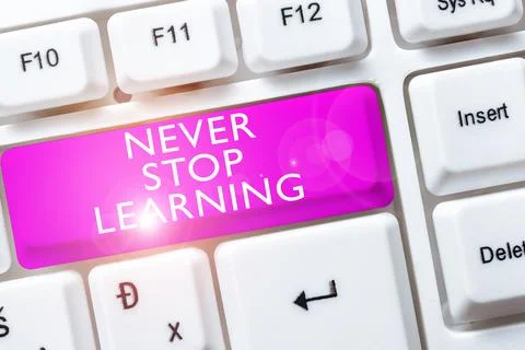 Text caption presenting Never Stop Learning. Business concept Continue to Stock Photos