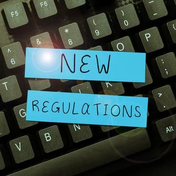 Text caption presenting New Regulations. Concept meaning Regulation controlling Stock Photos