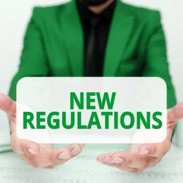 Text caption presenting New Regulations. Word for Regulation controlling the 写真素材