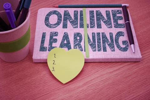 Text caption presenting Online Learning. Business approach Larning with the Stock-Fotos