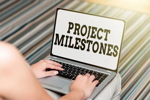 Text caption presenting Project Milestones. Internet Concept duration that shows Foto stock