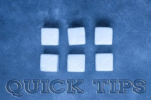 Text caption presenting Quick Tips. Internet Concept small but particularly Stockfoto's