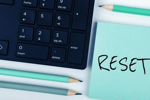 Text caption presenting Reset. Business overview cause device return to its 库存照片