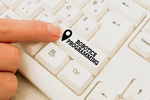 Text caption presenting Robotics Programming. Business approach software that Stock Photos