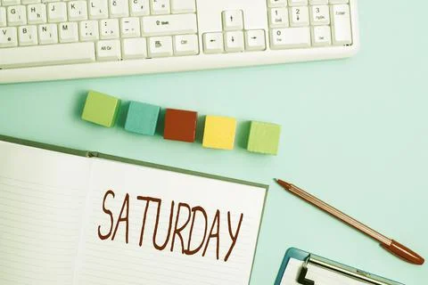 Text caption presenting Saturday. Word Written on First day of the weekend 写真素材