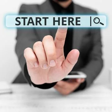 Text caption presenting Start Here. Business approach telling someone this is Foto stock