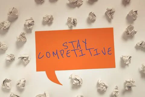 Text caption presenting Stay Competitive. Business concept moving from the use Photos