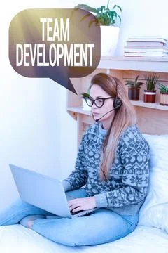 Text caption presenting Team Development. Business approach learn why and how Foto stock