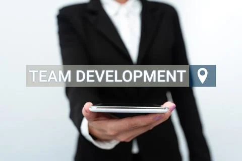 Text caption presenting Team Development. Concept meaning learn why and how Foto stock