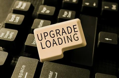 Text caption presenting Upgrade Loading. Word Written on advancement of Foto stock