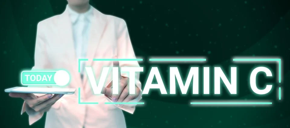 Text caption presenting Vitamin C. Concept meaning it promotes healing and helps Foto stock