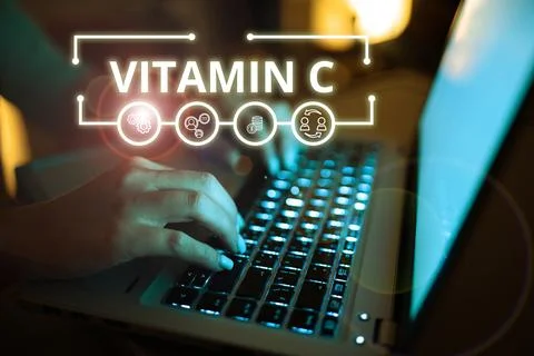 Text caption presenting Vitamin C. Conceptual photo it promotes healing and Foto stock