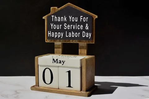 Text on chalkboard and white cube block with dark background Stock Photos