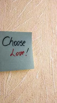 Text Choose love on post it. Writing on colorful sticky note. Bucharest, Ro.. Stock Photos