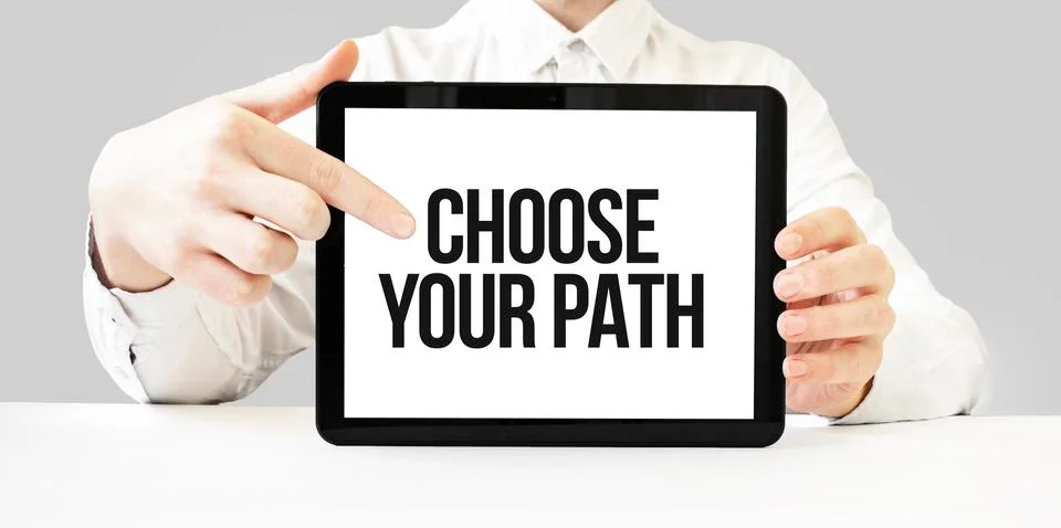 Text CHOOSE YOUR PATH on tablet display in businessman hands on the white bak Stock Photos