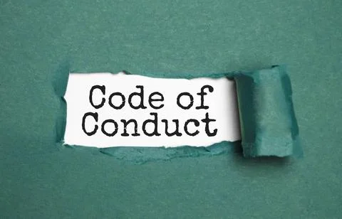 The text Code of conduct appearing behind torn brown paper Stock Photos
