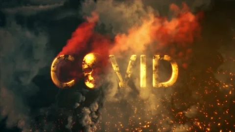 Text covid with skull burning on dark smoke bg - loop video Stock Footage 194267424
