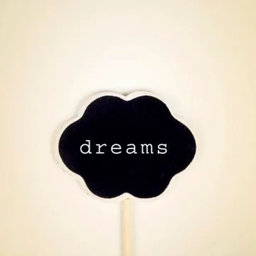 Text dreams written in a thought bubble, with a retro effect Stock Photos