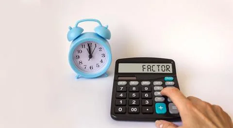 Text factor on calculator and clock on white background Stock Photos