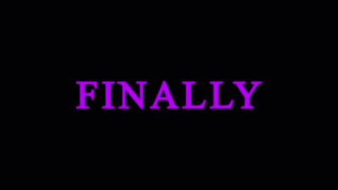 Text 'Finally' appearing with glitch effect in cinematic motion against bla.. Stock Footage 344035333