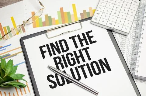 Text Find The Right Solution on file folder with charts and pen Foto stock