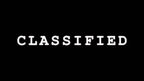 Text flashes CLASSIFIED repeatedly on black background during espionage thr.. Video stock 343478997