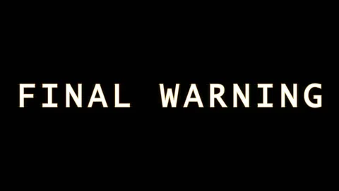 Text flashing warning messages on black background with subtle cinematic moti Stock Footage 344032349