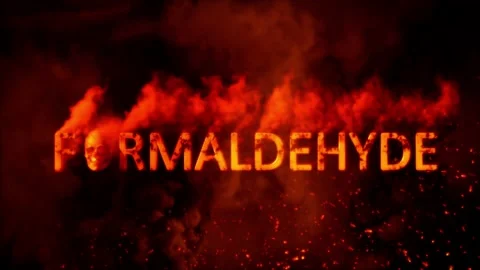 Text formaldehyde with scary man skull on burning backdrop - loop video Stock Footage 194679525