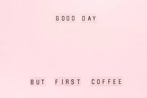 Text Good day, but first coffee on pastel pink paper background. Layout Top v Stock Photos