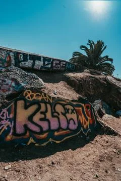 Text graffiti on the rock Stock Photos