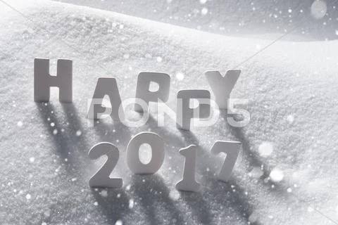 Text Happy 2017 With White Letters In Snow, Snowflakes Stock Photos