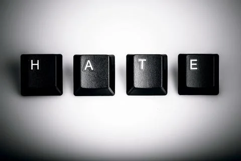Text hate formed with computer keyboard keys on white background Stock Photos