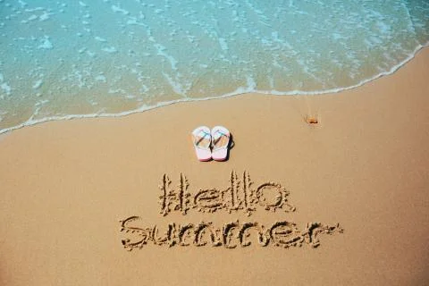 Text hello summer on ocean sand beach Stock Photos